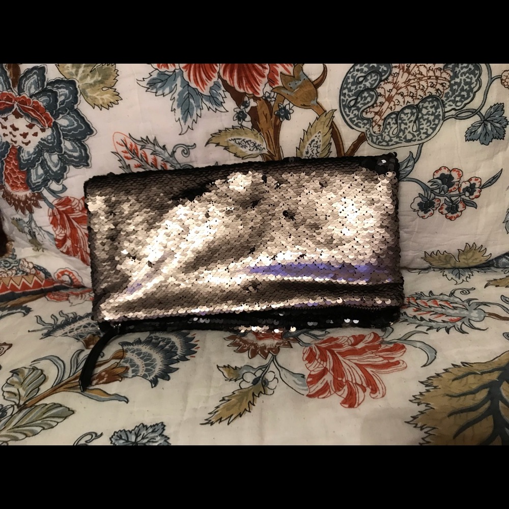 Never used Stella and Dot Margeux clutch.